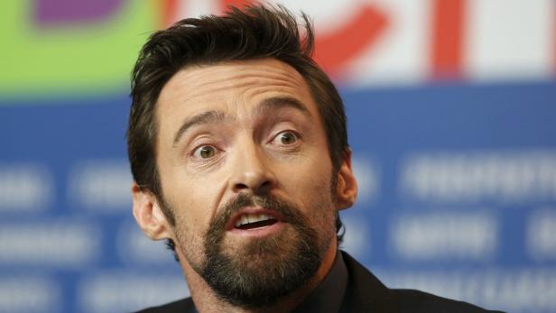 Actor Hugh Jackman speaks during a news conference to promote the movie &quot;Les Miserables&quot; at the 63rd Berlinale International Film Festival in Berlin February 9, 2013. REUTERS/Fabrizio Bensch (GERMANY - Tags: ENTERTAINMENT)