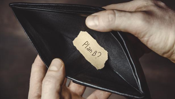 Symbolbild: Leeres Portemonnaie mit Zettel: "Plan B?"
