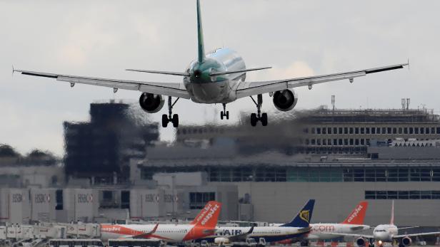 FILE PHOTO: A passenger aircraft lands at Gatwick Airport in southern England, Britain