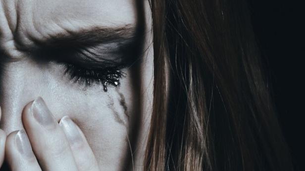 Woman with smudged makeup