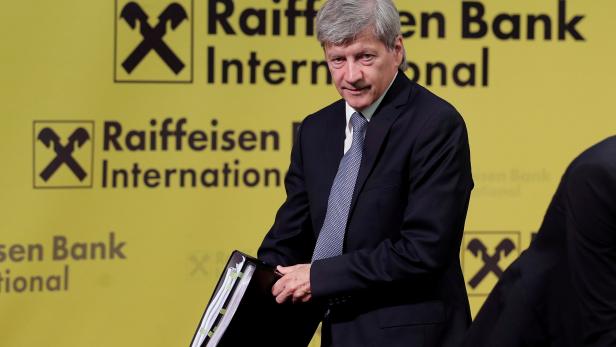 FILE PHOTO: Raiffeisen Bank International CEO Strobl leaves a news conference in Vienna