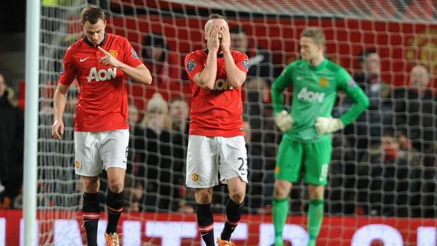Enttäuschte Fußballspieler von Manchester United nach einem Spiel.