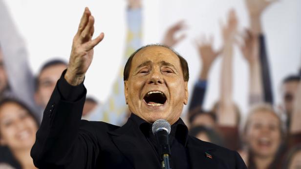 FILE PHOTO: Forza Italia party (PDL) leader Berlusconi speaks during Northern League rally in Bologna