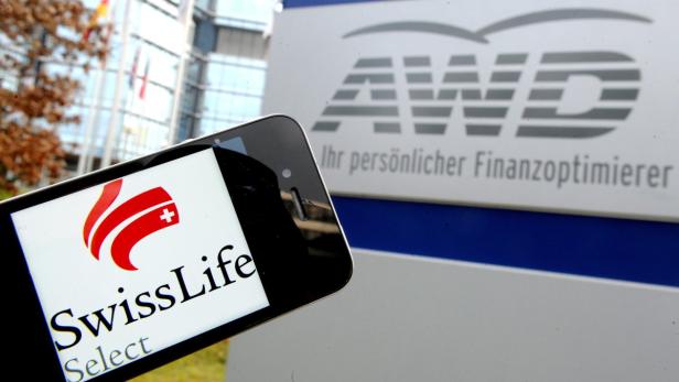 epa03489126 The logo of &#039;Swiss Life Select&#039; on a smart phone held in front of the headquarters of financial services company AWD in Hanover, Germany, 28 November 2012. AWD is going to be restructured and renamed by its Swiss parent group Swiss Life as part of a million euro austerity program. Up to 300 jobs in Germany will be cut and the company renamed Siwss Life Select. EPA/JULIAN STRATENSCHULTE