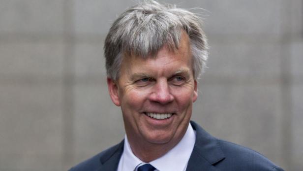 JC Penney Chief Executive Ron Johnson smiles as he arrives at the New York state Supreme Court in Manhattan in this March 1, 2013 file photo. Johnson is out as CEO of the department store chain which said on April 8, 2013 that former boss Mike Ullman would return as CEO less than two years after Johnson replaced him. REUTERS/Lucas Jackson/Files (UNITED STATES - Tags: CRIME LAW BUSINESS)