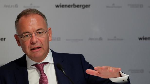 Austrian brickmaker Wienerberger Chief Executive Scheuch addresses a news conference in Vienna
