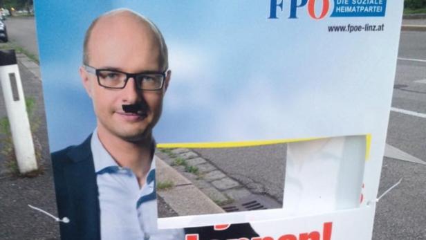 Zerstörte und beschmierte Wahlplakate der FPÖ Linz, Stadtrat Detlef Wimmer, OÖ.