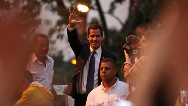 Venezuelan opposition leader Juan Guaido, who many nations have recognized as the country's rightful interim ruler, speaks to supporters in Caracas