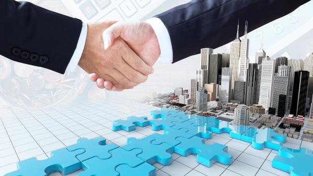 merger and acquisition business concept, join puzzle pieces