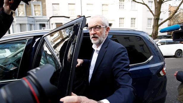 British opposition Labour Party leader Jeremy Corbyn leaves his home in London