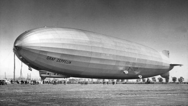 1929: Spectators gather around the Graf Zeppelin (LZ-127) during its round-the-world trip. (Photo by American Stock/Getty Images)