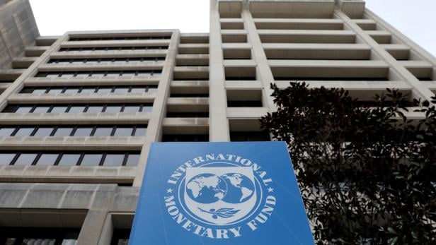 FILE PHOTO: FILE PHOTO: The International Monetary Fund (IMF) headquarters building is seen ahead of the IMF/World Bank spring meetings in Washington