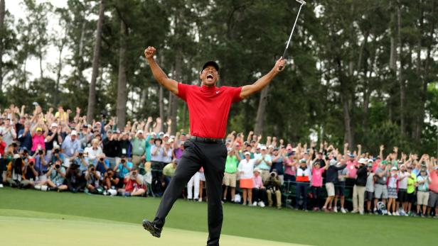 Tiger woods celebrates after winning the 2019 Masters