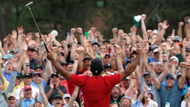 Tiger woods celebrates after winning the 2019 Masters
