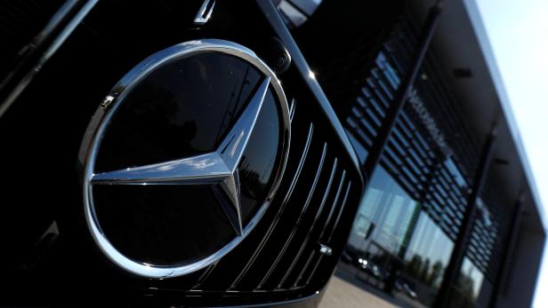 A Mercedes Benz logo is pictured outside of Mercedes Benz branch in Stuttgart