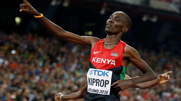 FILE PHOTO: Asbel Kiprop of Kenya reacts after winning the men's 1500 metres final during the 15th IAAF World Championships at the National Stadium in Beijing