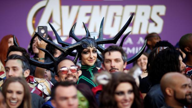 Fans dressed up in costume await the cast members on the red carpet at the world premiere of the film "The Avengers: Endgame" in Los Angeles