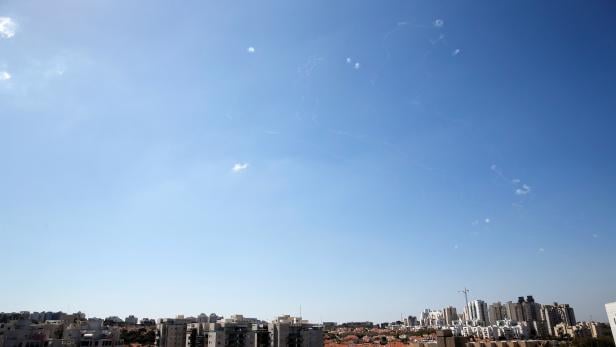 Iron Dome anti-missile projectiles intercept rockets that were fired from Gaza, above the Israeli city of Ashkelon