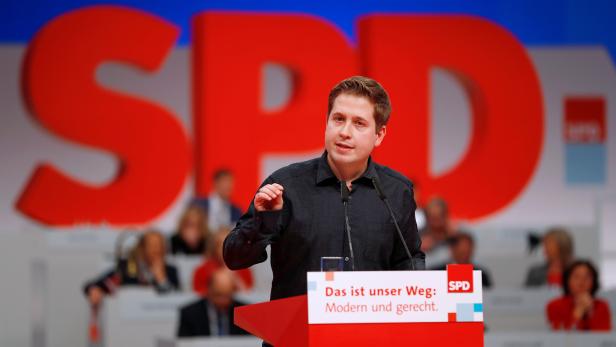 FILE PHOTO: Kevin Kuehnert, head of the SPDs youth wing, speaks during an SPD party convention in Berlin