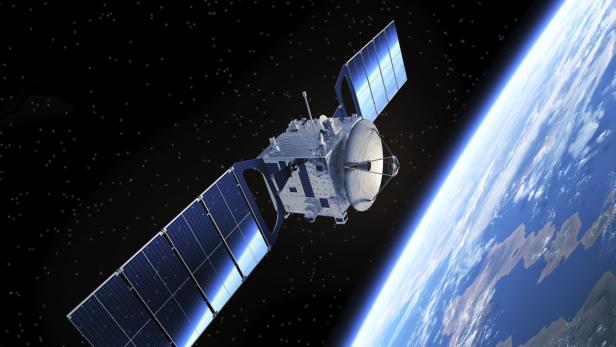 Satellit vor der Erdkugel im Weltraum.