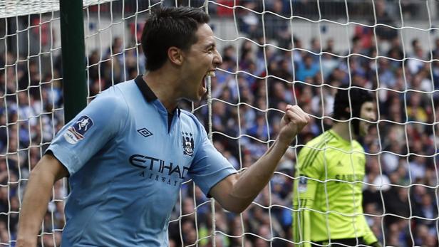 Manchester City&#039;s Samir Nasri celebrates after scoring against Chelsea during their FA Cup semi-final soccer match at Wembley Stadium in London April 14, 2013. REUTERS/Suzanne Plunkett (BRITAIN - Tags: SPORT SOCCER)