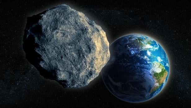 Symbolbild: Ein großer Asteroid, der der Erde nahe kommt.