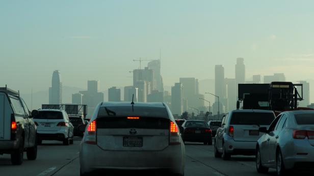 Commuters navigate early morning traffic as they drive towards downtown in Los Angeles, California