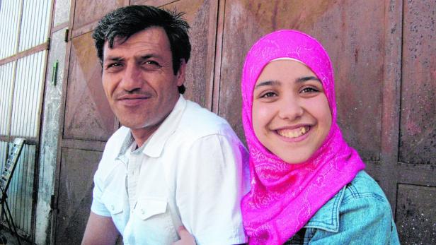 Die Syrer, hier die älteste Tochter Gharam mit ihrem Papa, fühlen sich in Österreich herzlich aufgenommen