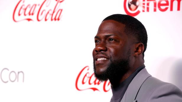 FILE PHOTO: Kevin Hart poses during the CinemaCon Big Screen Achievement Awards ceremony at Caesars Palace in Las Vegas