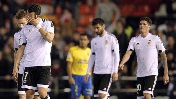 Enttäuschte Fußballspieler des FC Valencia nach einem Spiel.