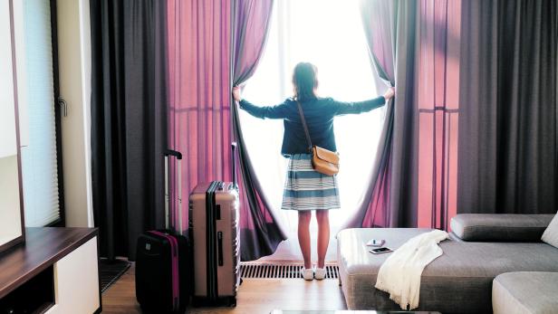 Tourist woman staying in luxury hotel