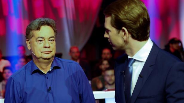 Party heads Kurz and Kogler wait for the start of a TV discussion in Vienna