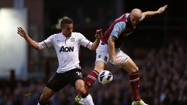 West Ham United&#039;s James Collins (R) challenges Manchester United&#039;s Robin van Persie during their English Premier League soccer match at The Boleyn Ground in London April 17, 2013. REUTERS/Eddie Keogh (BRITAIN - Tags: SPORT SOCCER) FOR EDITORIAL USE ONLY. NOT FOR SALE FOR MARKETING OR ADVERTISING CAMPAIGNS. NO USE WITH UNAUTHORIZED AUDIO, VIDEO, DATA, FIXTURE LISTS, CLUB/LEAGUE LOGOS OR &quot;LIVE&quot; SERVICES. ONLINE IN-MATCH USE LIMITED TO 45 IMAGES, NO VIDEO EMULATION. NO USE IN BETTING, GAMES OR SINGLE CLUB/LEAGUE/PLAYER PUBLICATIONS