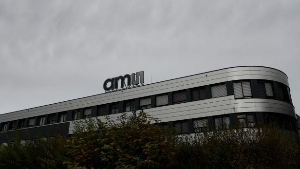 The Logo of Austrian sensor specialist AMS is seen on their factory in Unterpremstaetten