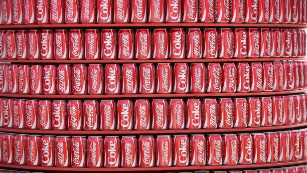 File photograph of Coca Cola cans at a concession Coca-Cola will im Kaffeegeschäft mitmischen.