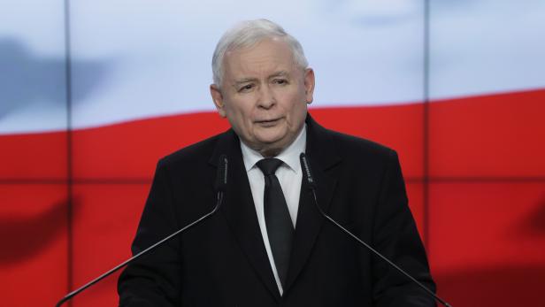 Poland's Prime Minister Mateusz Morawiecki and Law and Justice (PiS) leader Jaroslaw Kaczynski attend the announcement of the new government ministers at the party headquarters in Warsaw