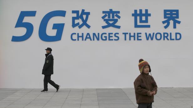 A sign for the World 5G Exhibition is seen in Beijing