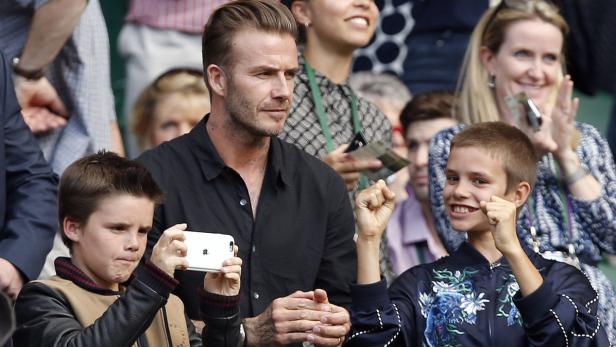 David Beckham mit Romeo und Cruz.