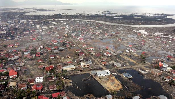 FILE PHOTO: An aerial view shows the tsunami-devastated city of Banda Aceh on the Indonesian island of Sumatra