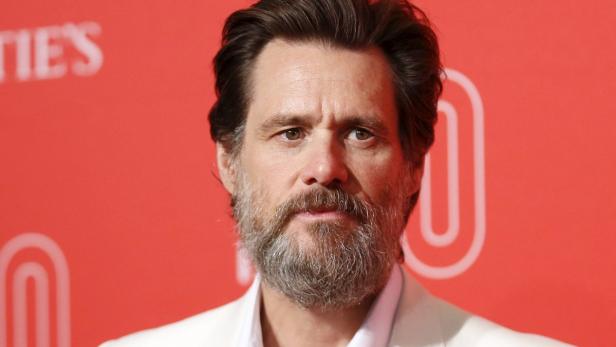 Actor Jim Carrey poses at LACMA's 50th anniversary Jim Carrey