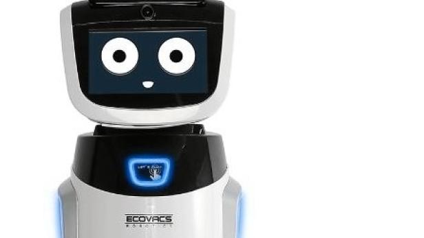 Ein Ecovacs Robotics Roboter mit einem Bildschirm, der ein Gesicht anzeigt.