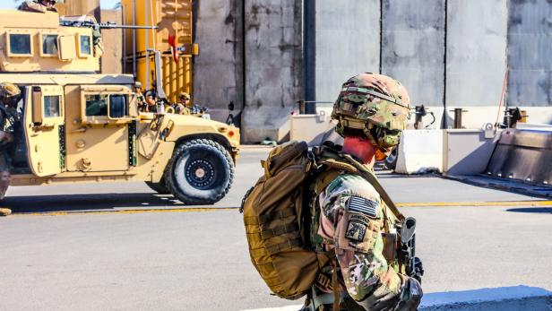 U.S. Army soldiers man a defensive position at Forward Operating Base Union III in Baghdad