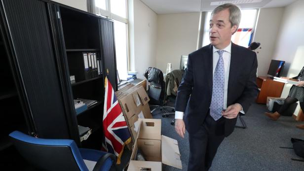 Brexit Party leader Farage packs his items in his office at the EU Parliament in Brussels