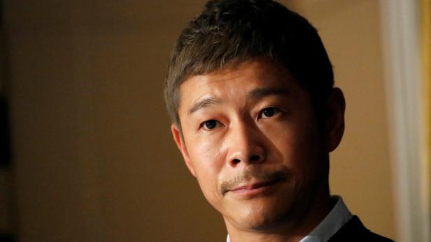 FILE PHOTO: Japanese billionaire Yusaku Maezawa, founder and chief executive of online fashion retailer Zozo, who has been chosen as the first private passenger by SpaceX, attends a news conference at the Foreign Correspondents' Club of Japan in Tokyo