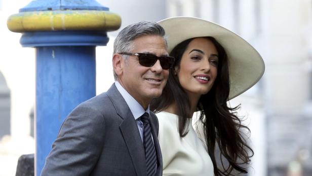 George und Amal Clooney bei einer Veranstaltung.