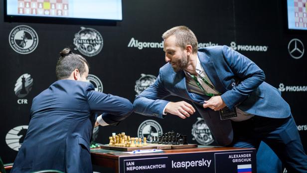 Russian chess player Alexander Grischuk smells hand sanitiser as he takes part in the Candidates Tournament in Yekaterinburg