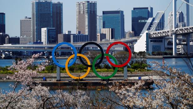 FILE PHOTO: Giant Olympic rings are seen at the waterfront area at Odaiba Marine Park in Tokyo, Japan