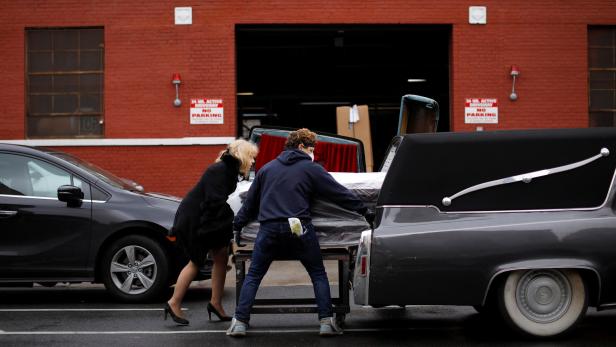 Doris V. Amen, owner of Jurek-Park Slope Funeral Home picks up caskets for funerals in Brooklyn