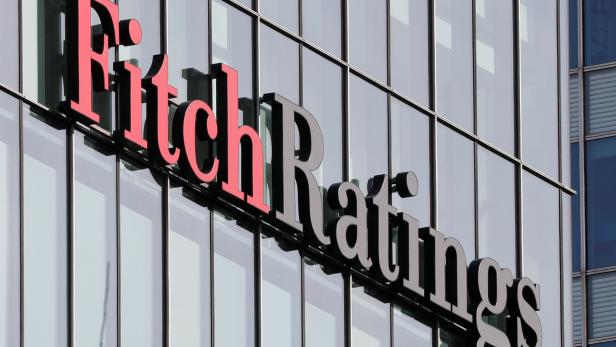 FILE PHOTO: The Fitch Ratings logo is seen at its offices at Canary Wharf financial district in London