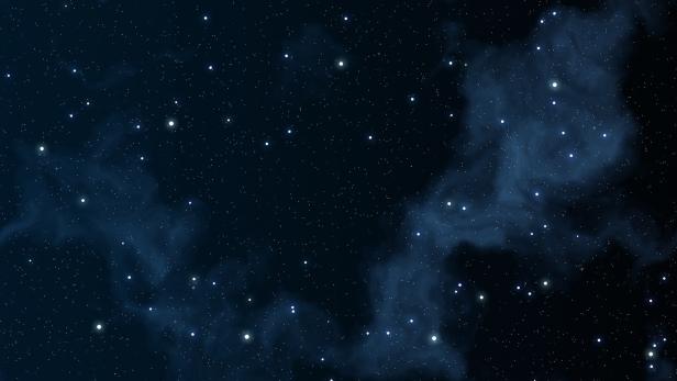 Ein Nachthimmel mit Sternen und einer blauen Nebelwolke.